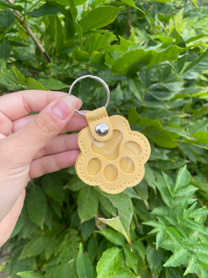 porte clé empreinte, souvenir, poil animaux jaune